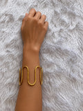 Loop brass bangle